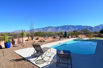 Relax Sitting Poolside looking at the Catalina Mountains